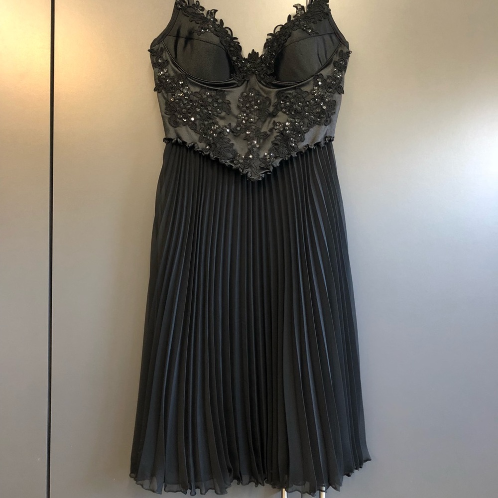 Black embellished sheer dress. Made in England.
